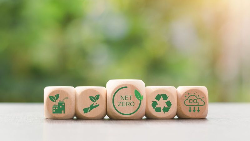 Wooden blocks and icons representing the concept of caring for nature together,Net Zero,Carbon Neutral Concepts ,Greenhouse Gas Reduction Policy,Carbon Neutral,Environmental Mind,Green Industry.