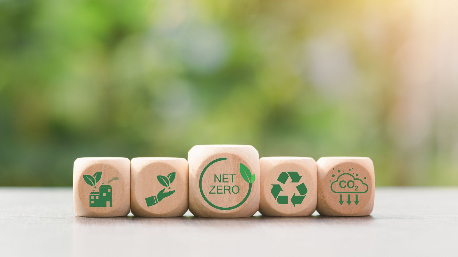 Wooden blocks and icons representing the concept of caring for nature together,Net Zero,Carbon Neutral Concepts ,Greenhouse Gas Reduction Policy,Carbon Neutral,Environmental Mind,Green Industry.